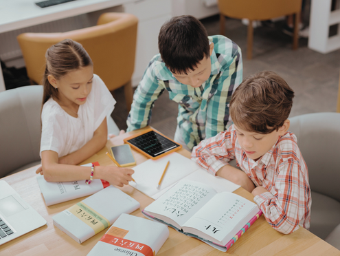 Students learning languages and communicating.