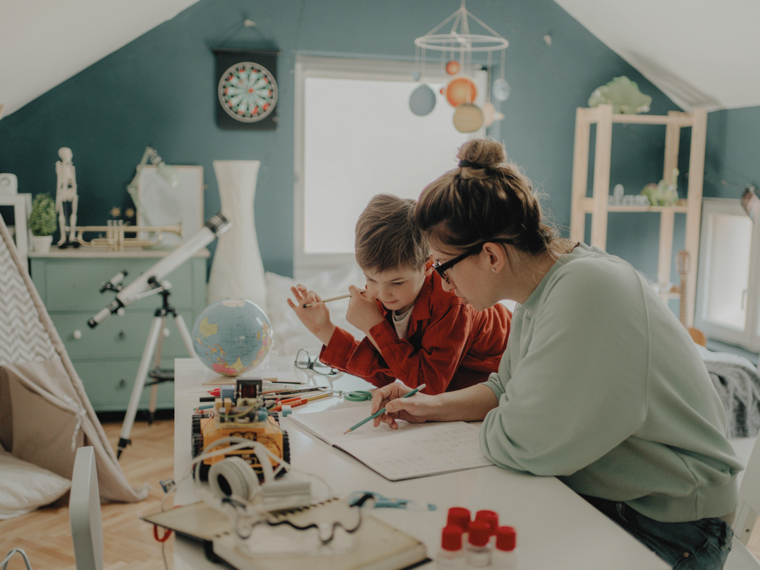 A parent and child improving literacy at home.