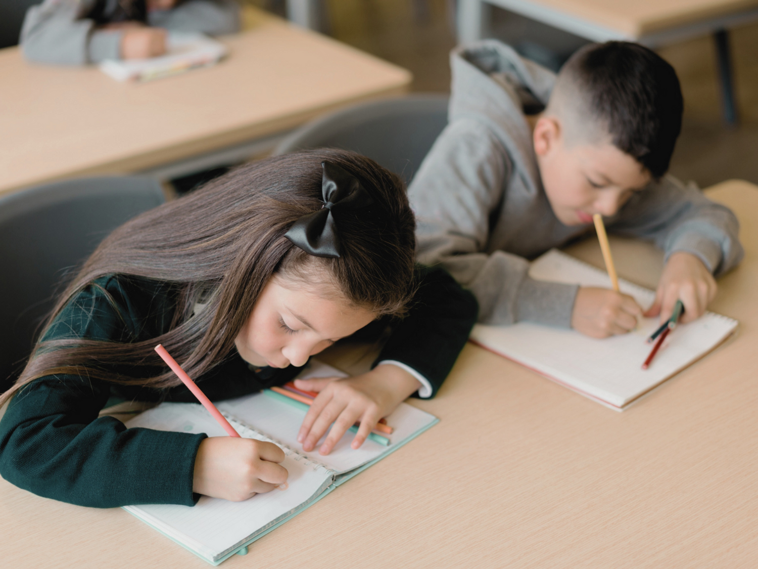 Students working through their vocabulary curriculum in the classroom.